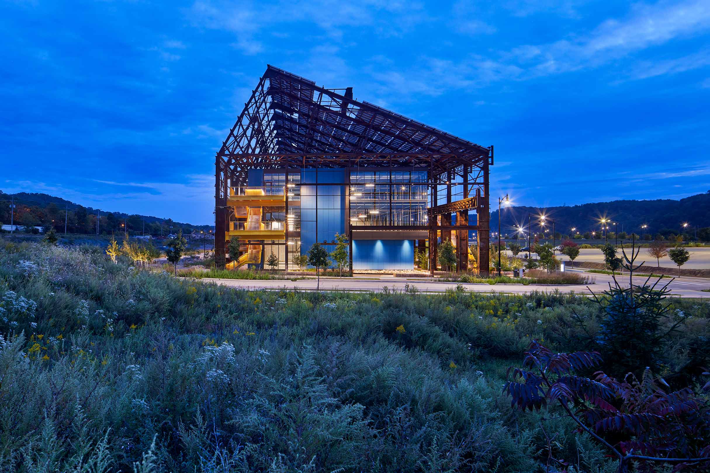 Exterior of the RIDC Mill 19 project at dusk