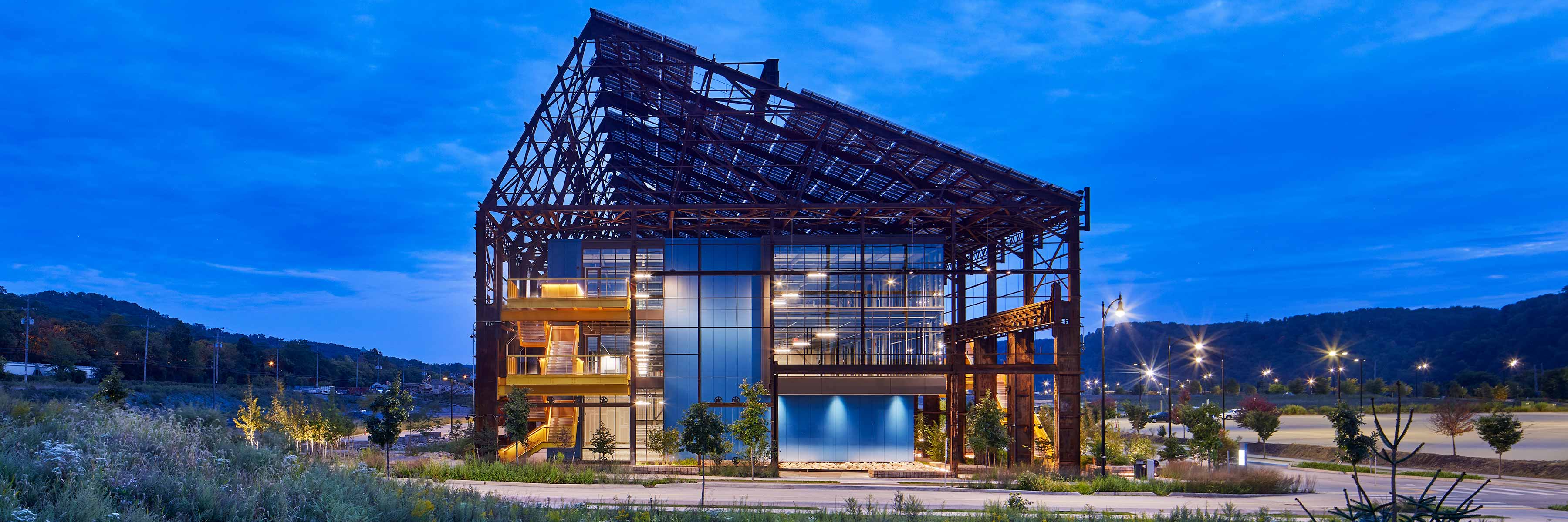 Exterior of the RIDC Mill 19 project at dusk